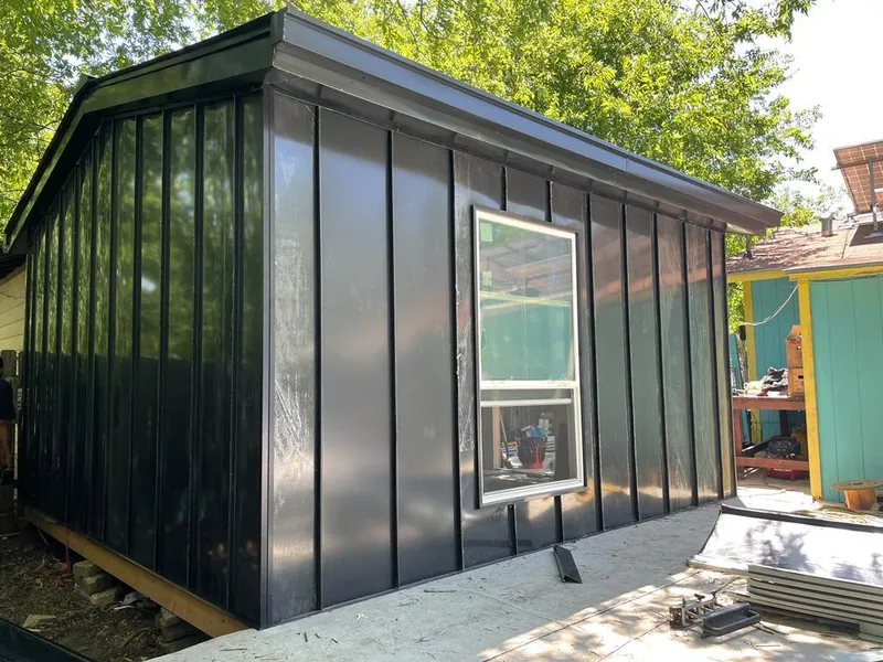 Black standing seam metal wall panels for Metal Roof Installation in Maple Grove