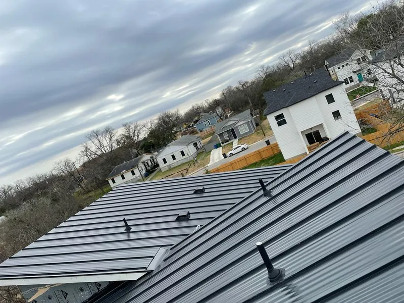 Standing seam metal roof panels with vents for Skylight Repair in Maple Grove